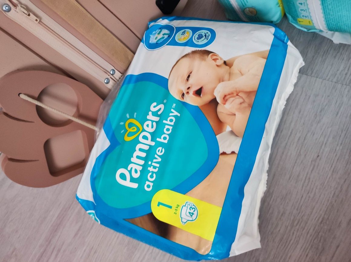 Pampers premium care 1 78szt X2=156szt plus pamper activ baby 1 43szt