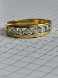 Золота каблучка, з діамантами 1.015 карат, 750 проба.