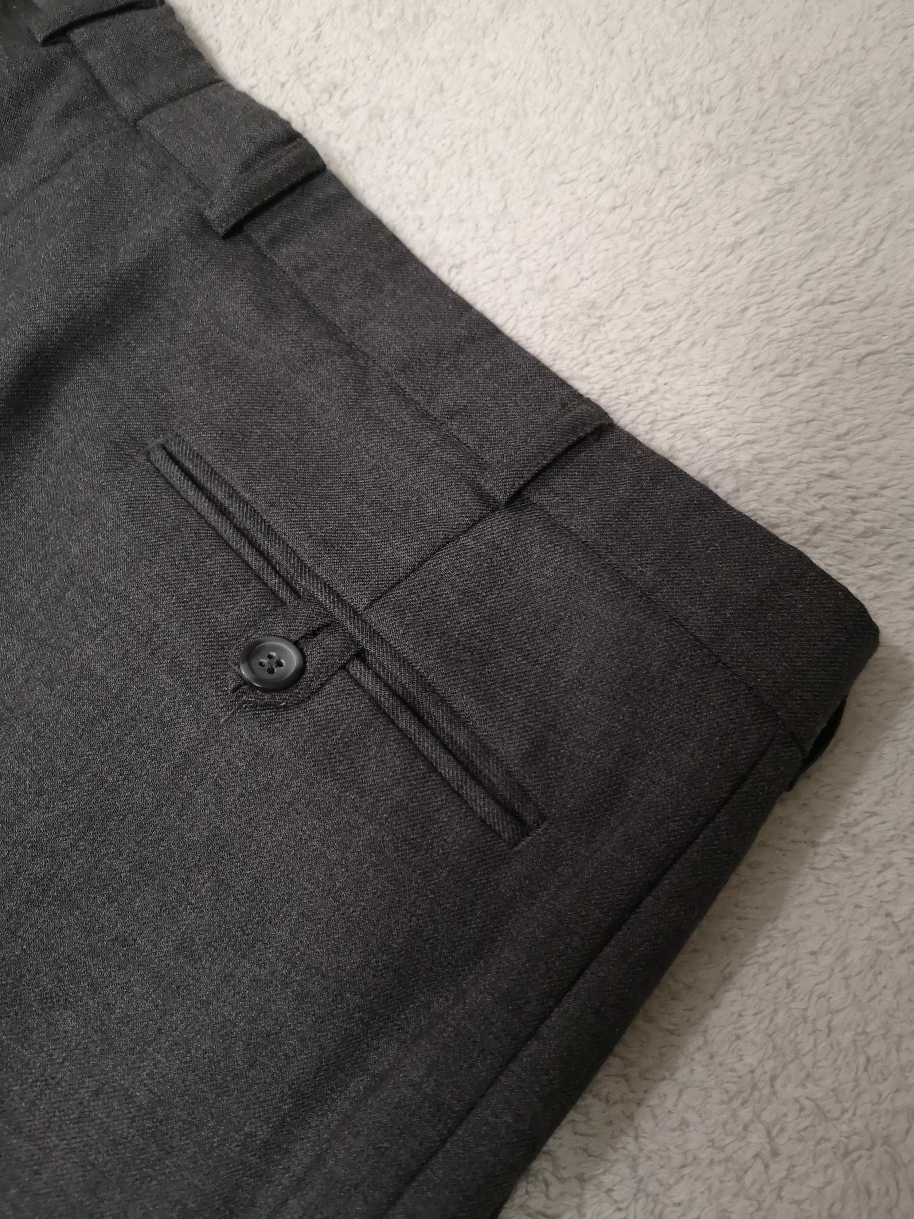 Eleganckie wełniane spodnie wizytowe w kant model Hermes 38R jak nowe