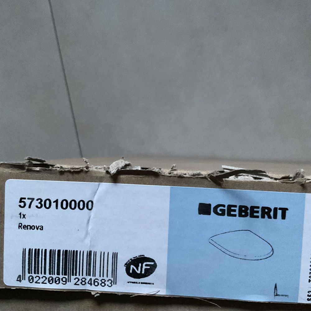 Geberit Renova deska WC z pokrywą biały zawiasy stal nierdzewna.