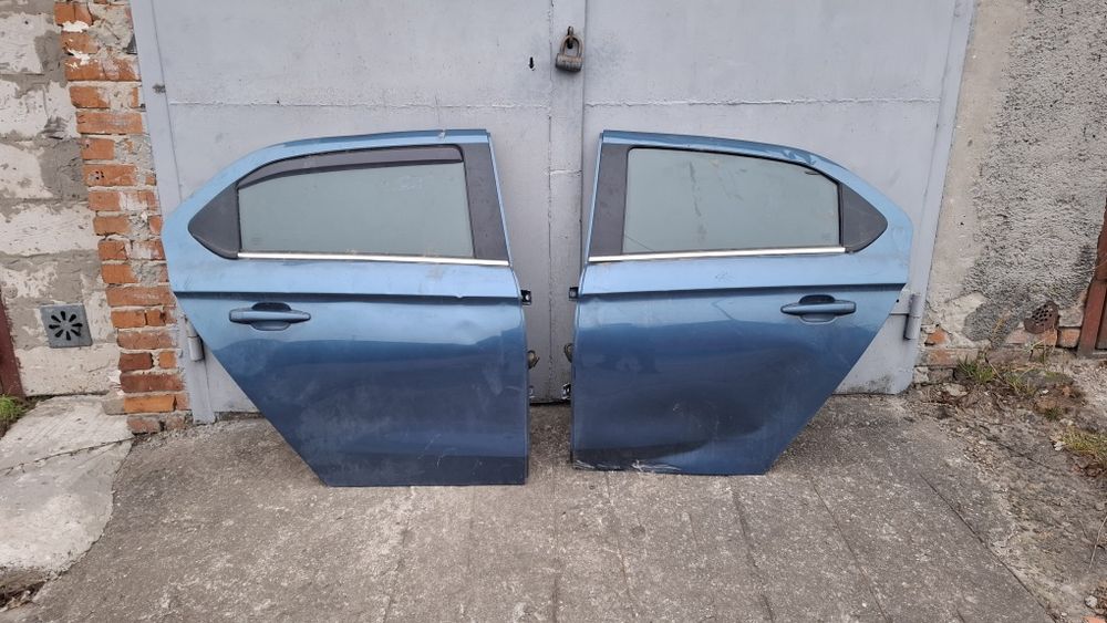 Двері Peugeot 301 карта скло замок дверки молдінг ручка пежо 301