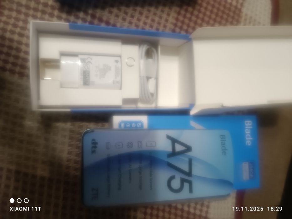 Продам новый мобильный телефон zte A75 nubia v60 design