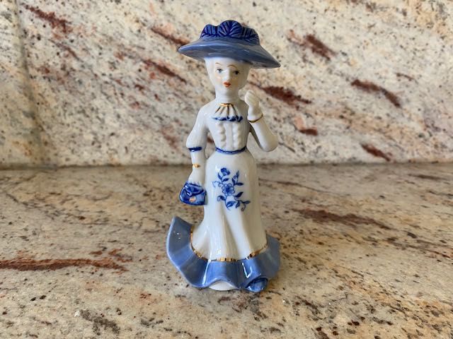 Estatueta em porcelana