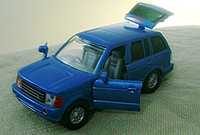 Carrinho 1:32  Land Rover TT Azul. Perfeita. ToysRus. Abre portas mala