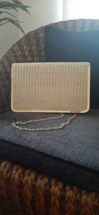 Mala Clutch versátil e elegante