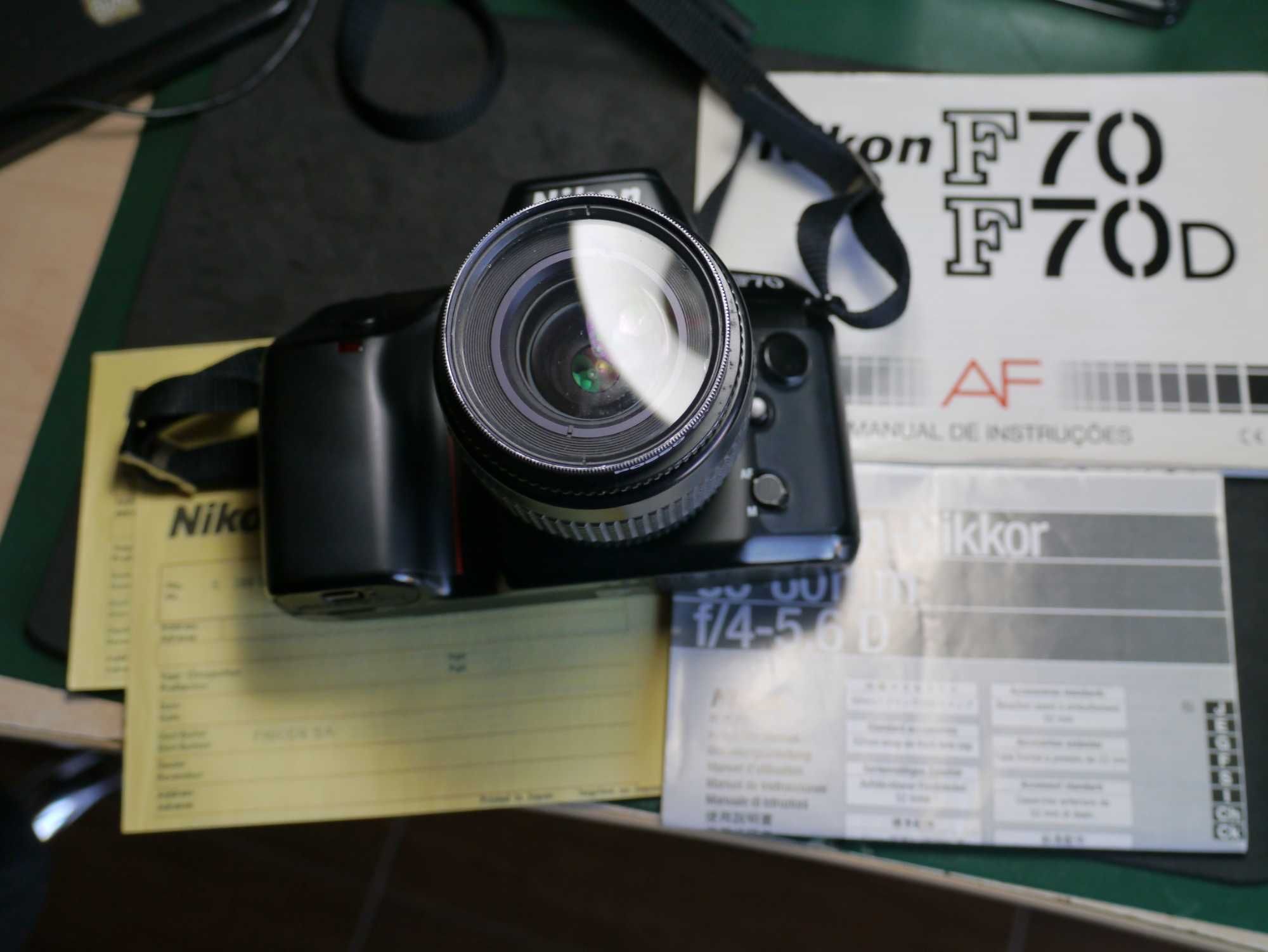 Conjunto Nikon AF camera e lente com manuais
