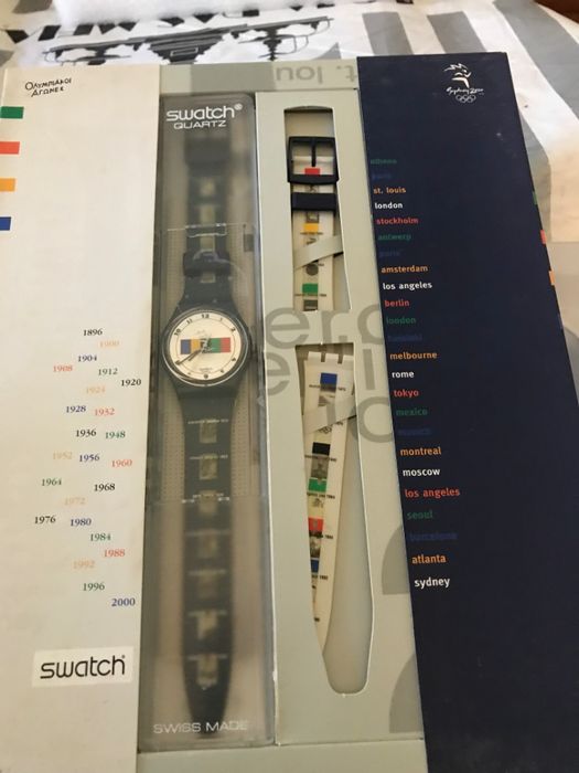 Relógios Swatch The Games of the New Millennium Sidney 2000, PIG