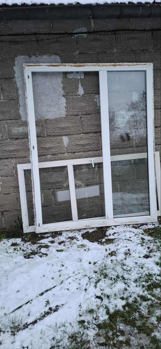 Okno tarasowe z moskitierą na drzwi