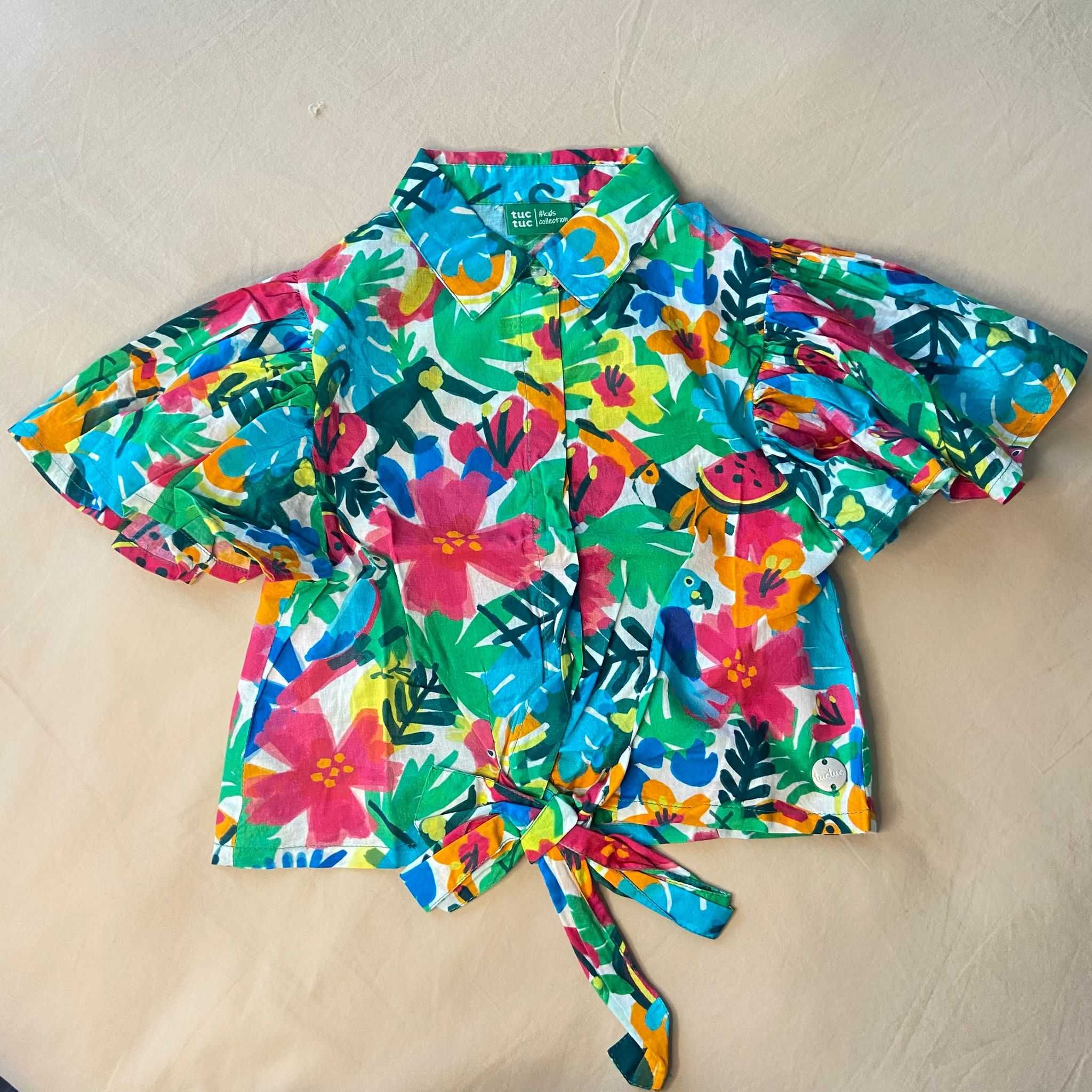 Camisa florida de manga curta, com laço à frente, 10 anos, da tuc tuc
