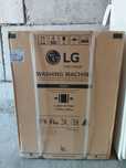 Стиральная машина в упаковке LG
