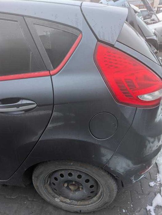 Błotnik tył tylny lewy Ford Fiesta MK7
