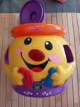 Garnuszek na klocuszek Fisher Price