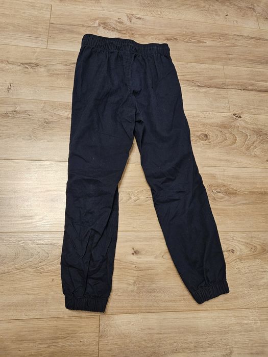 Spodnie chłopięce granatowe 134 H&M