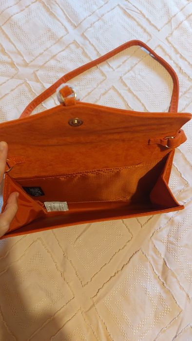 Mala tiracolo da Avon