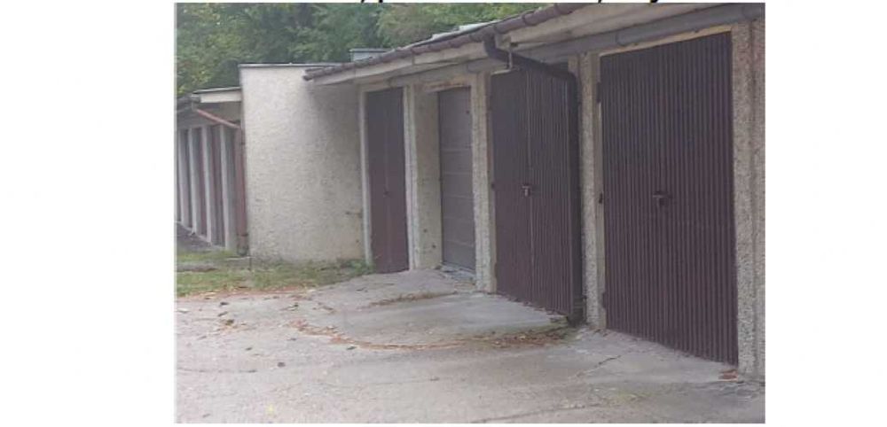 Syndyk sprzeda ½ udziału w garażu oraz  udziały gruntach