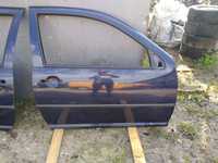 Drzwi prawe VW Golf IV 3d granatowe