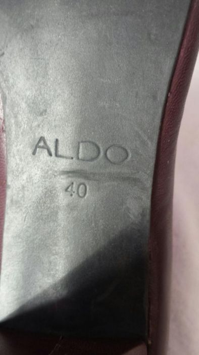 Pantofle damskie skórzane,czółenka na obcasie firmy Aldo
