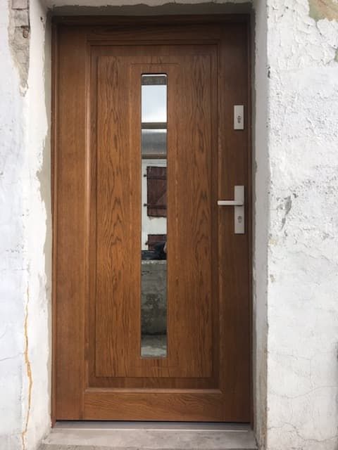 Drewniane drzwi zewnętrzne wejściowe od producenta z dowozem