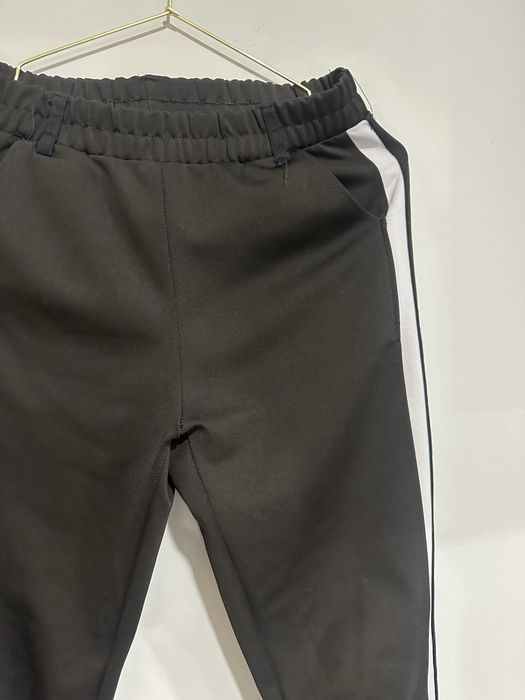 Sportowe spodnie damskie czarne na gumce S/M