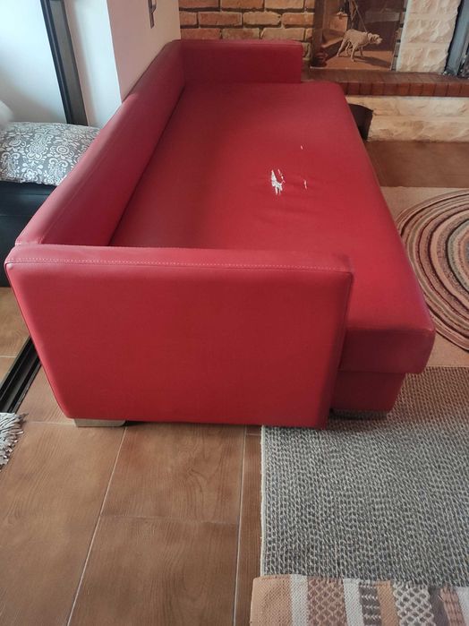 Sofá usado com pequeno defeito