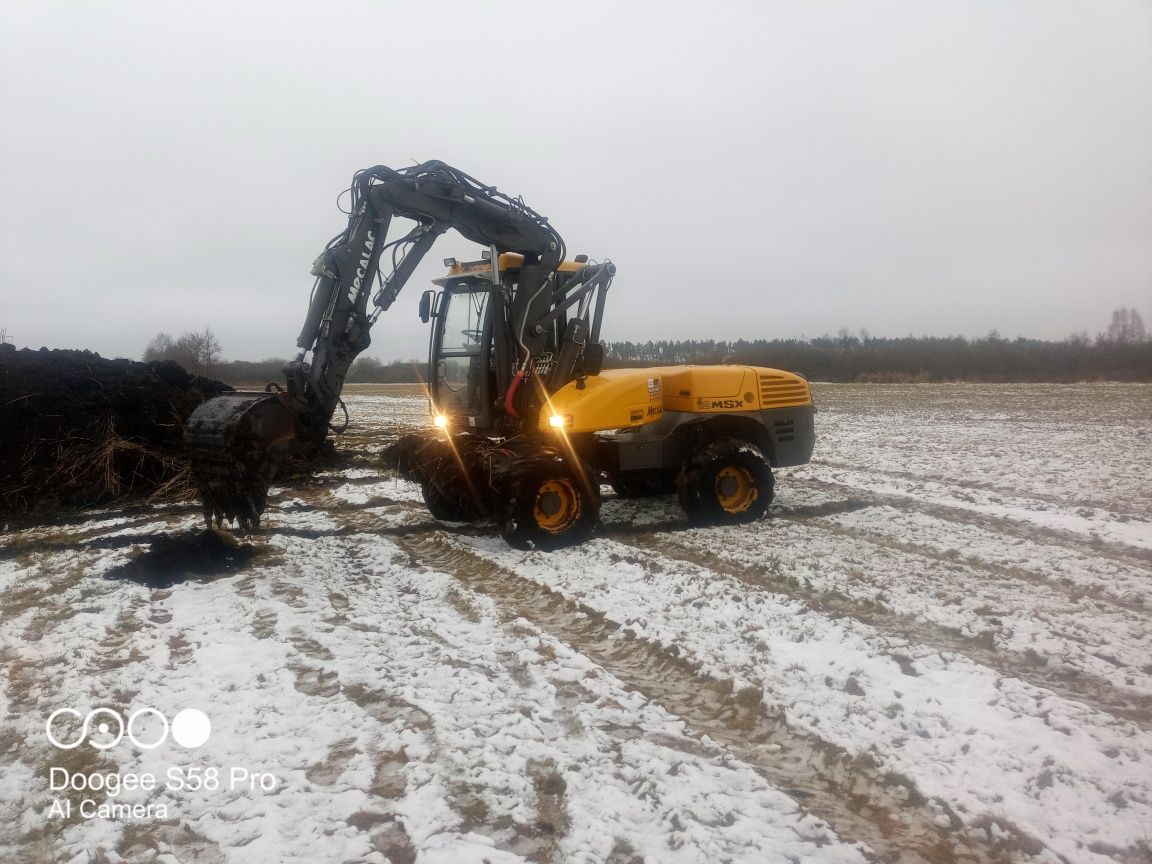 Usługi koparka kołową Mecalac 12 MSX