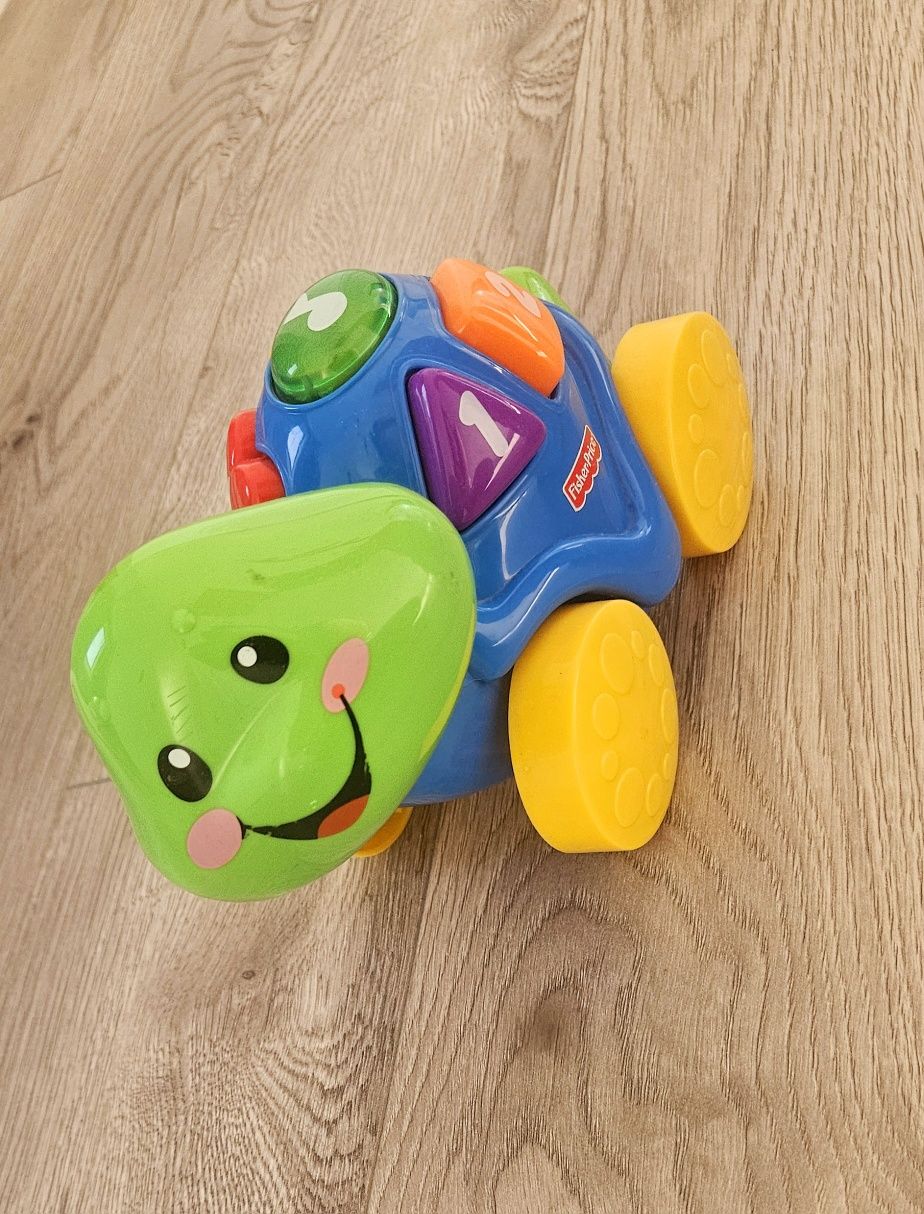 Śpiewający żółwik Fisher Price.