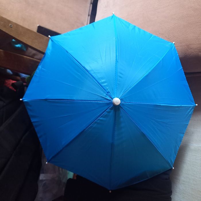 Нова парасолька на голову небесного кольору