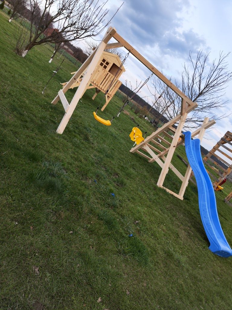 Plac zabaw dla dzieci zjezdzalnia ślizg huśtawki producent