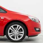 Nowy BŁOTNIK OPEL ASTRA J prawy lub lewy Czerwony Z50B GBH w KOLOR