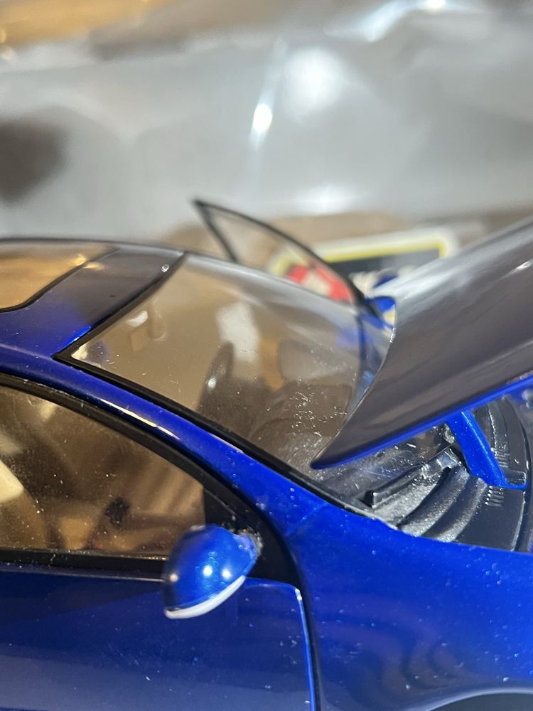 1:18 Volkswagen Golf V / Bburago niebieski.