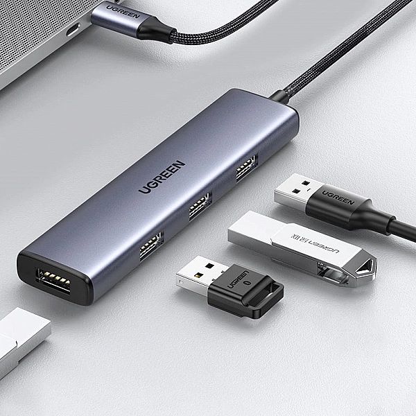 Ugreen rozdzielacz HUB USB Typ C - 4x USB 3.2 Gen 1 srebrny (CM473, 20