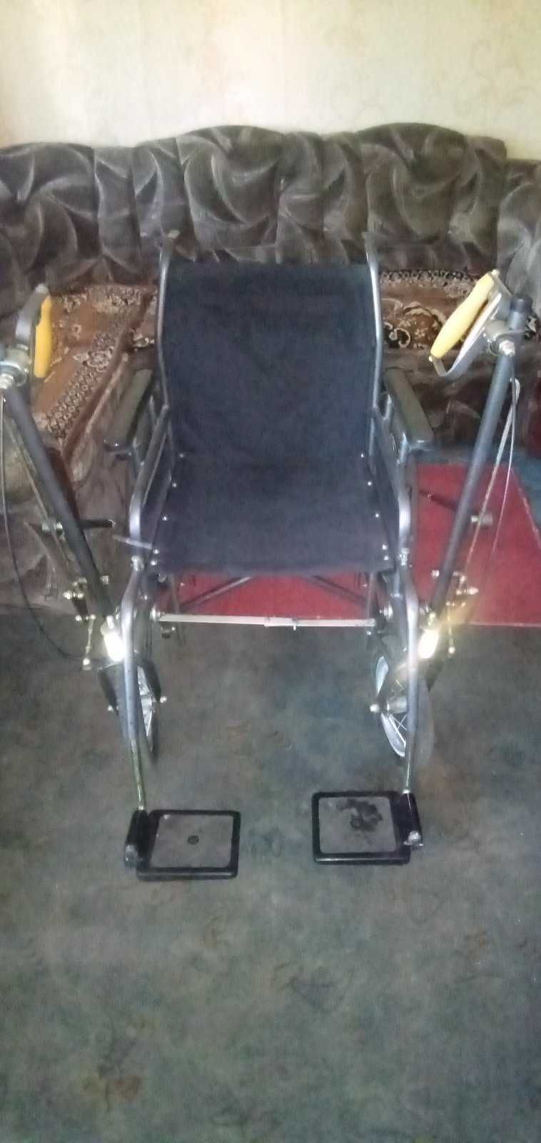 Продам инвалидную коляску дорожная