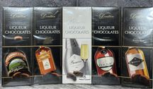 Цукерки Doulton в темному шоколаді з міцними напоями