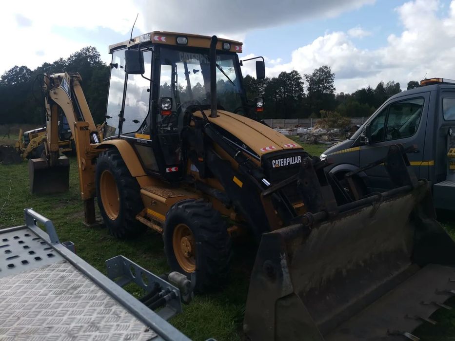 Caterpillar 428c  Cat 428C 2000 r  stan b.dobry