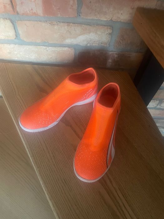 Buty turfy puma pomarańczowe