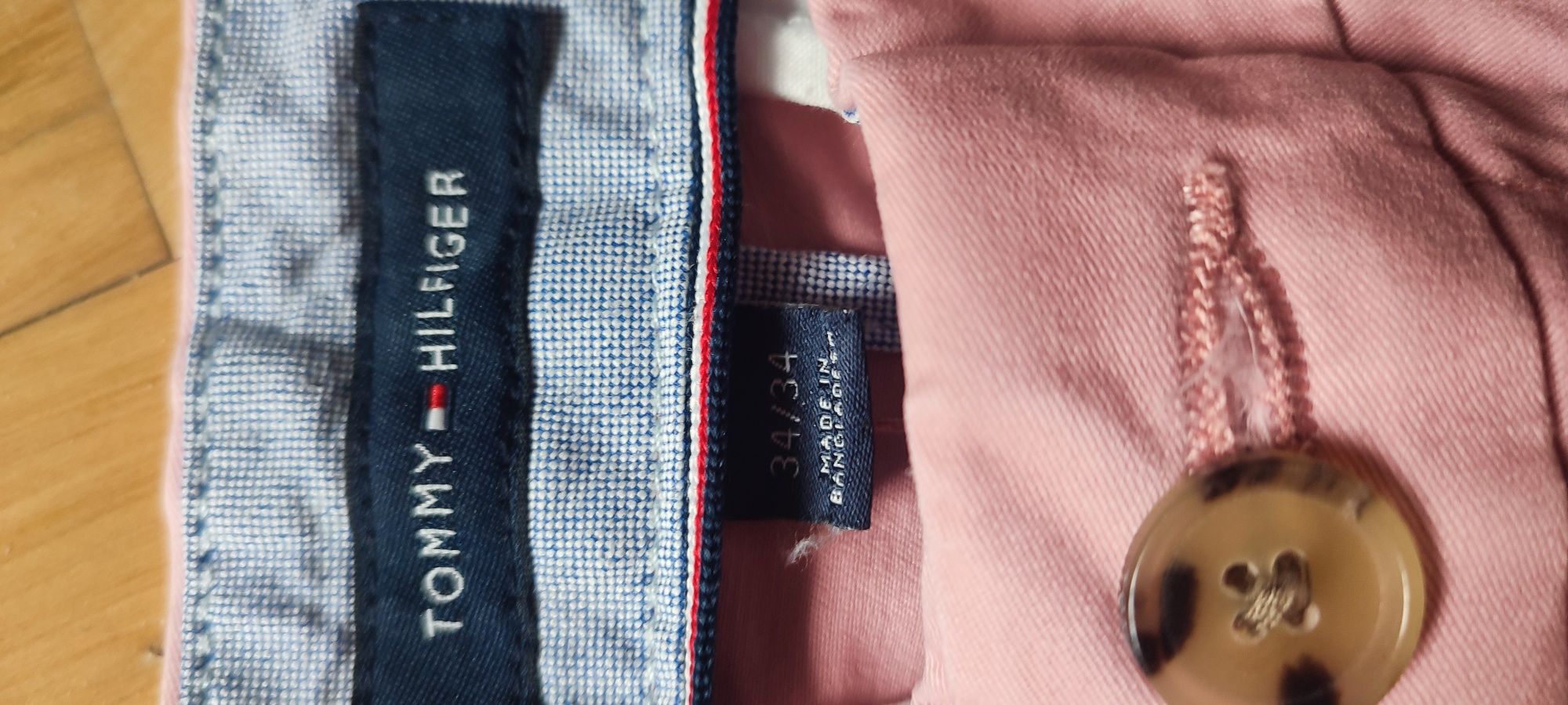 Tommy Hilfiger spodnie męskie chinosy 34/34 jasny róż