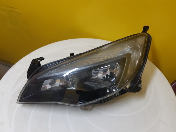 Lampa reflektor lewy przod Opel Astra j lift