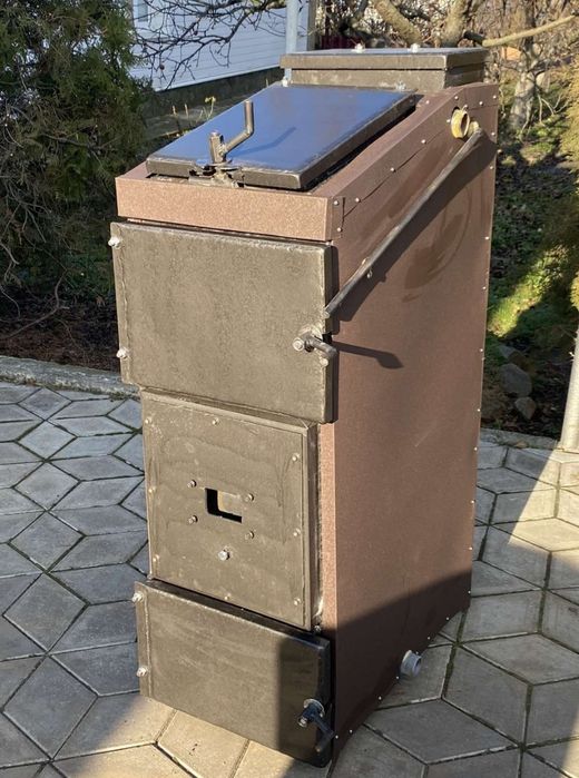 Пиролизний твердотопливный котел довгого горіння