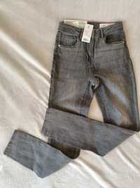 Nowe wycierane jeansy