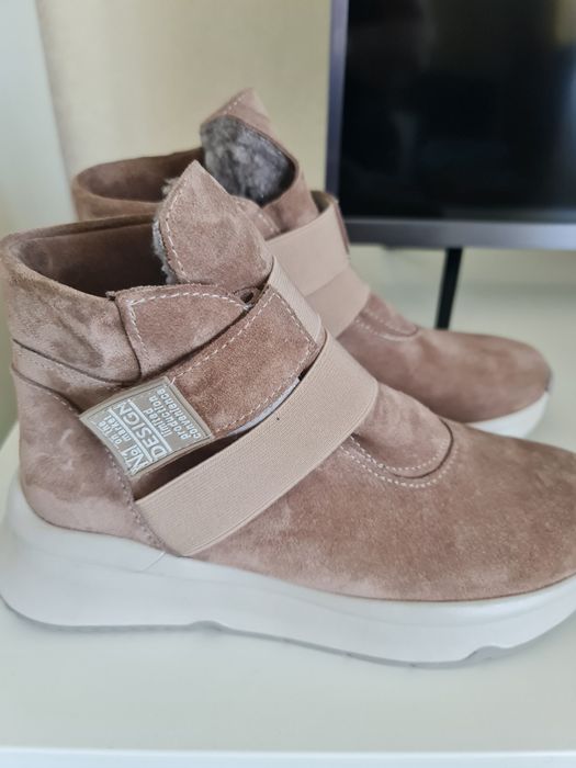 Продам новые ботинки зимние