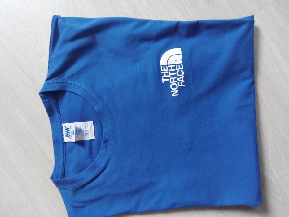 Niebieska koszulka t-shirt The North Face M. Polecam