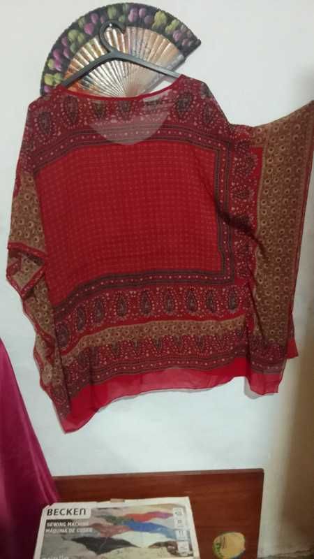 Roupa usada em bom estado