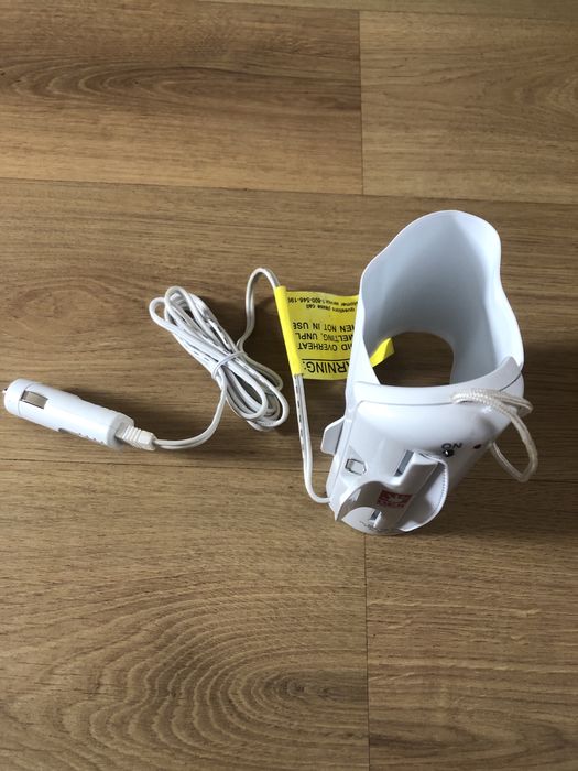 Підігрівач для пляшечок для машини