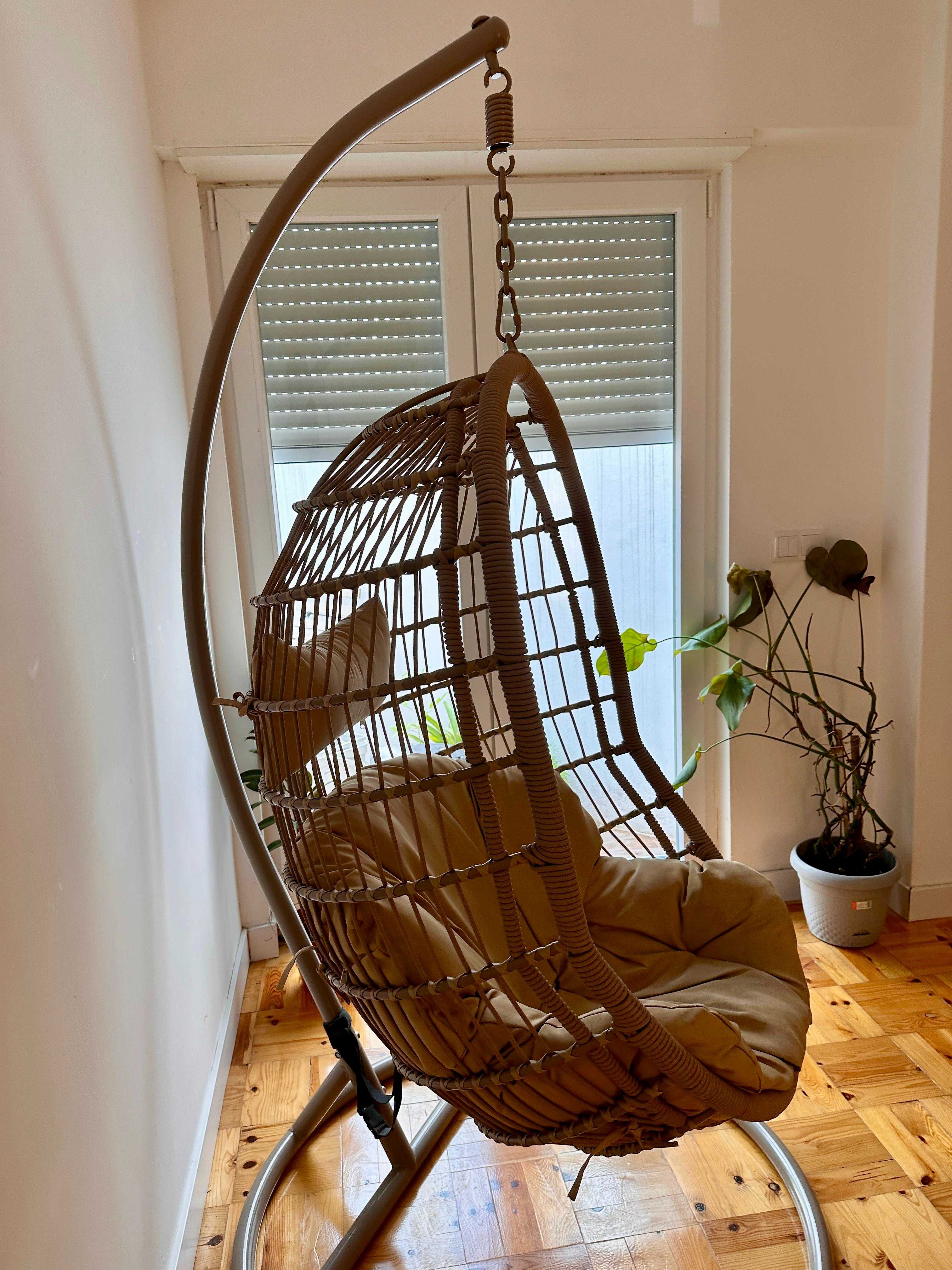 Hanging swing chair with beige/brown structure & cushions