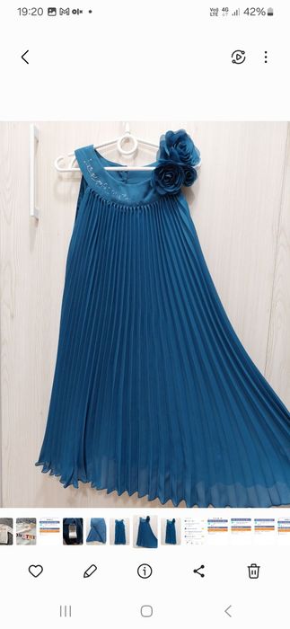 Сукня святкова на дівчинку 9 - 10 років
Буча Киї