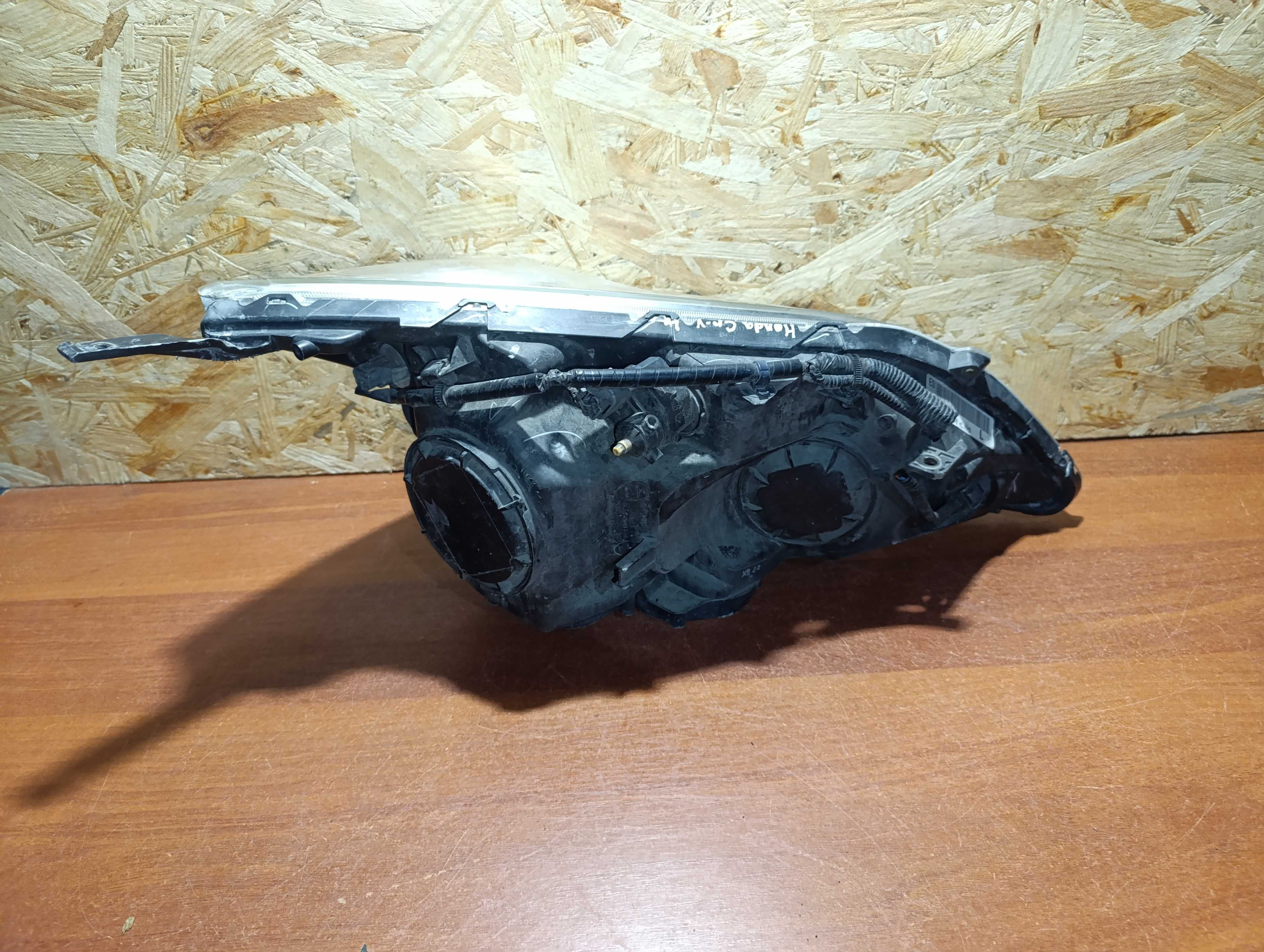 Фара левая галоген Honda CR-V 3 дорестайлинг 2007-09г.в.