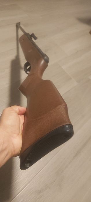 Arma de chumbo igual a nova