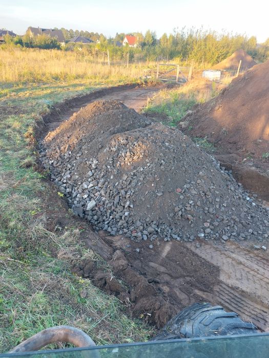 Budowa dróg Rozbiórki budynków Roboty ziemne Sendom Niwelacja Stawy