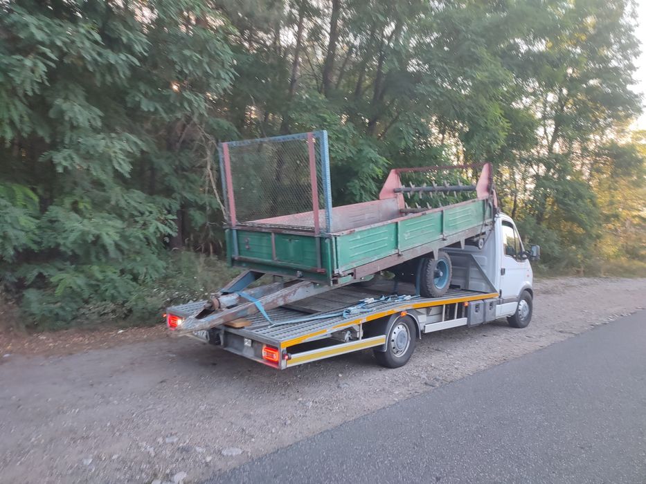 Autolaweta Laweta Pomoc drogowa transport samochodów osobowych maszyn