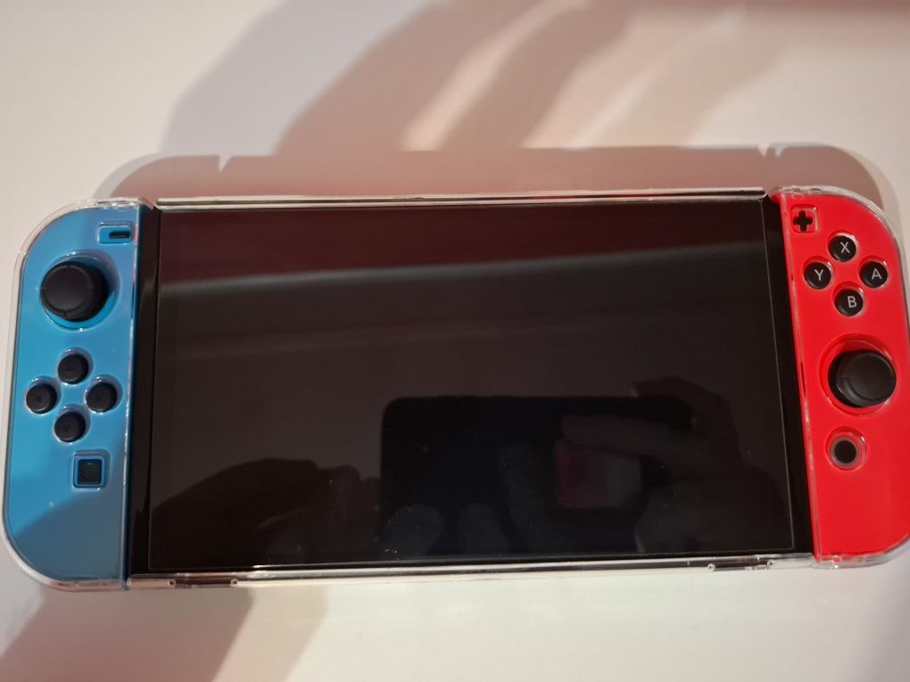 Nintendo Switch OLED + 3 gry + etui